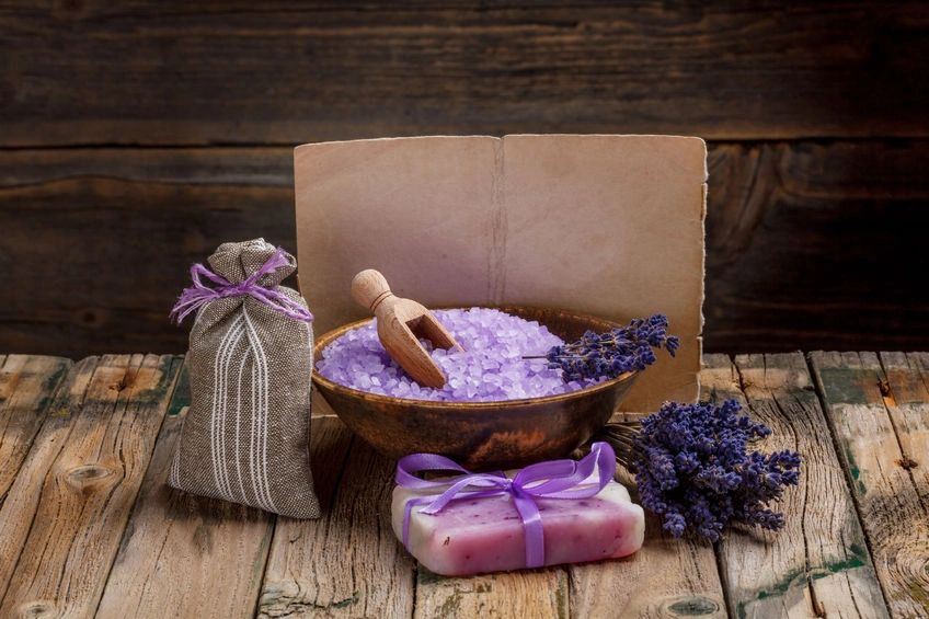 A colorful shop filled with hanging and stacked soaps and bath products